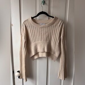 Urban Outfitters cropped sweater with flare sleeve & side slit. Size S